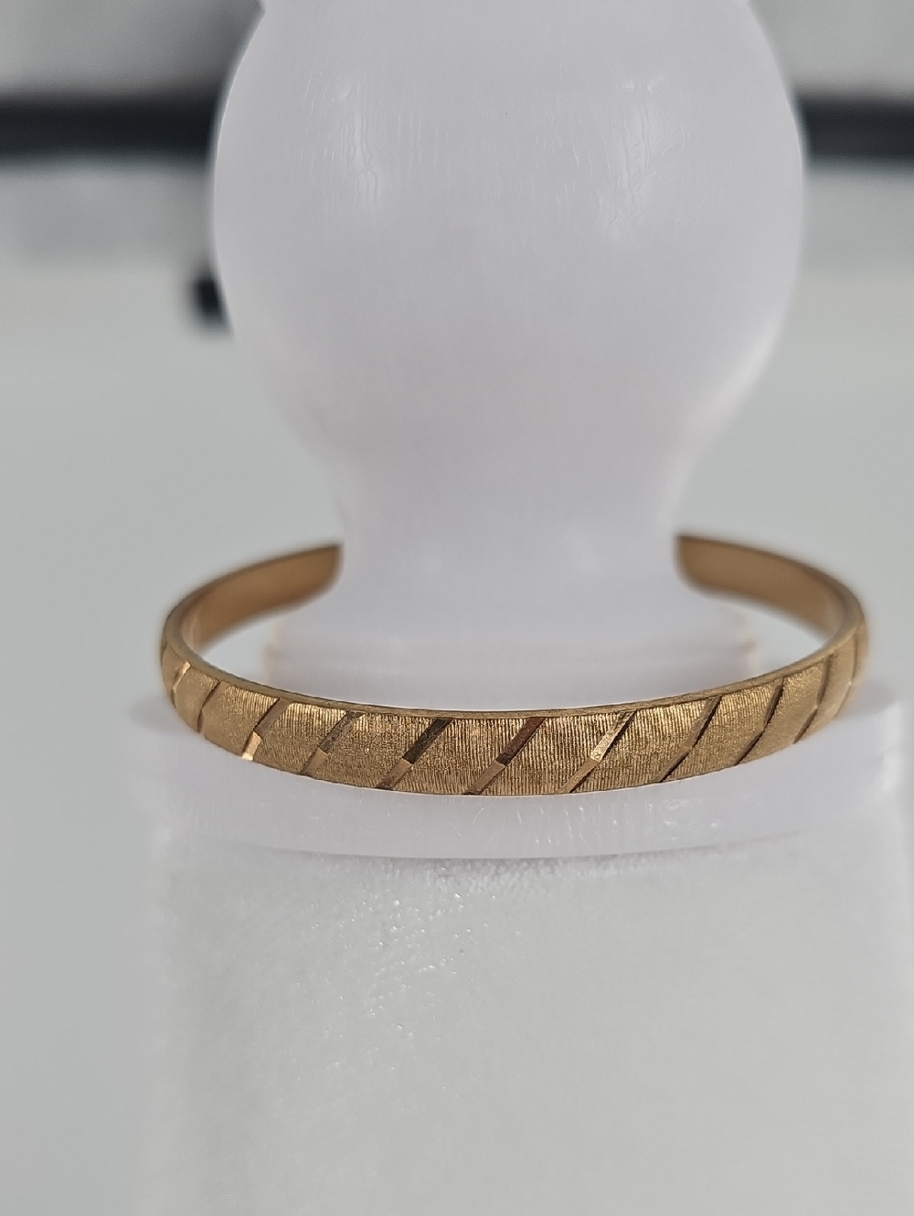 Monet Classic Textured Gold Tone Bangle Bracelet